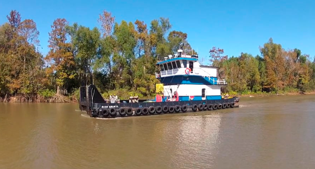 Image of tugboat on bayou in Louisiana — screenshot from Carson Energy video produced by PWG Media.